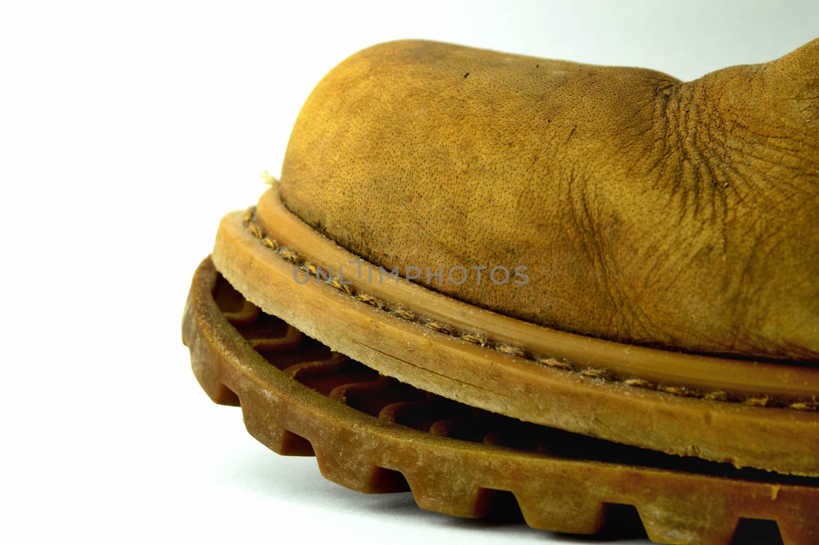 Illustration photo - Old broken shoe on a white background.