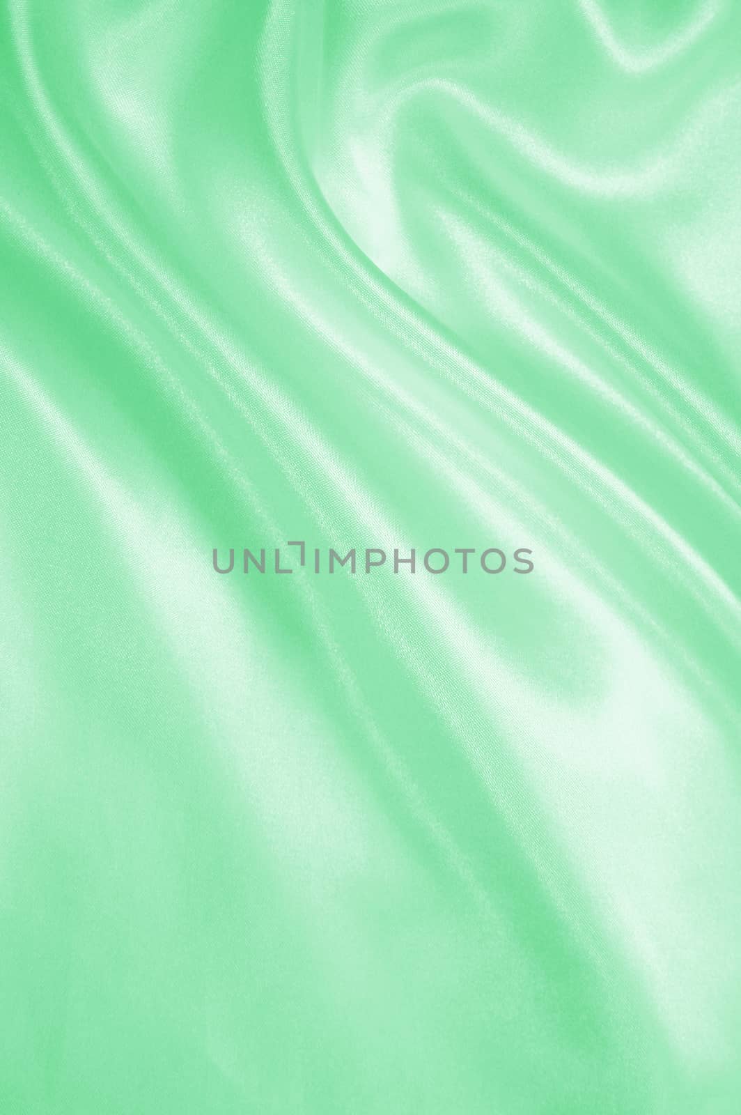 Smooth elegant green silk or satin as background  by oxanatravel