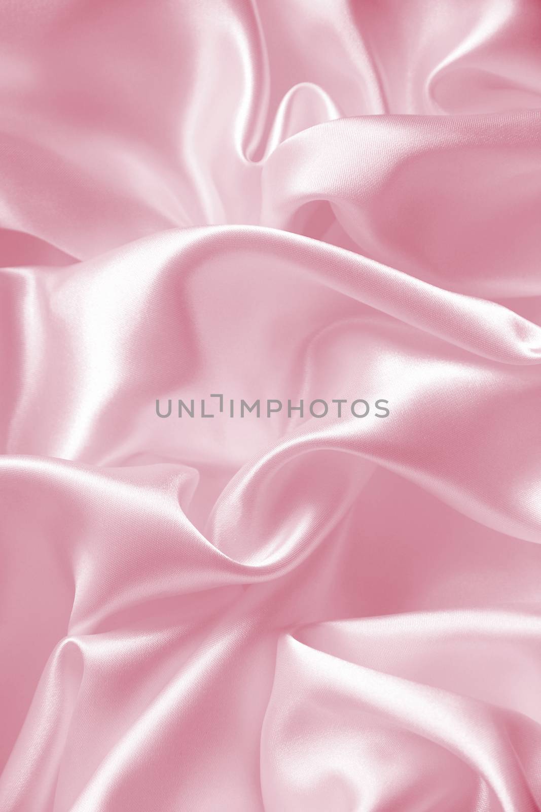 Smooth elegant pink silk or satin as wedding background by oxanatravel