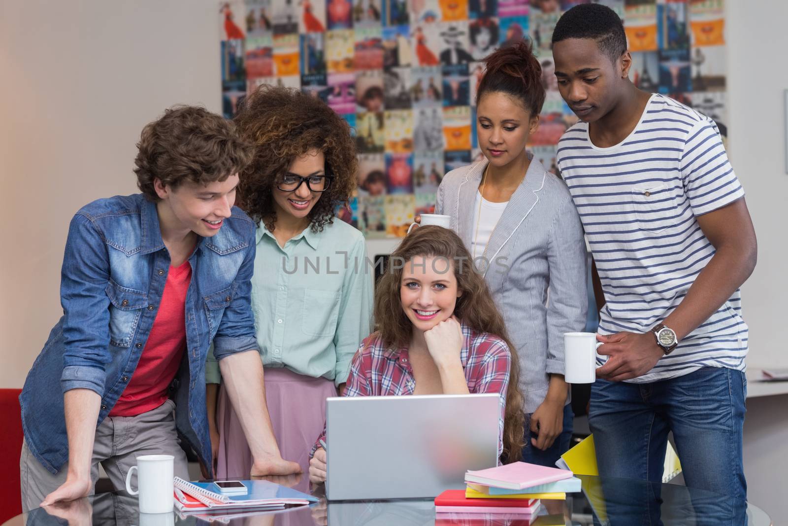 Fashion students working as a team  by Wavebreakmedia