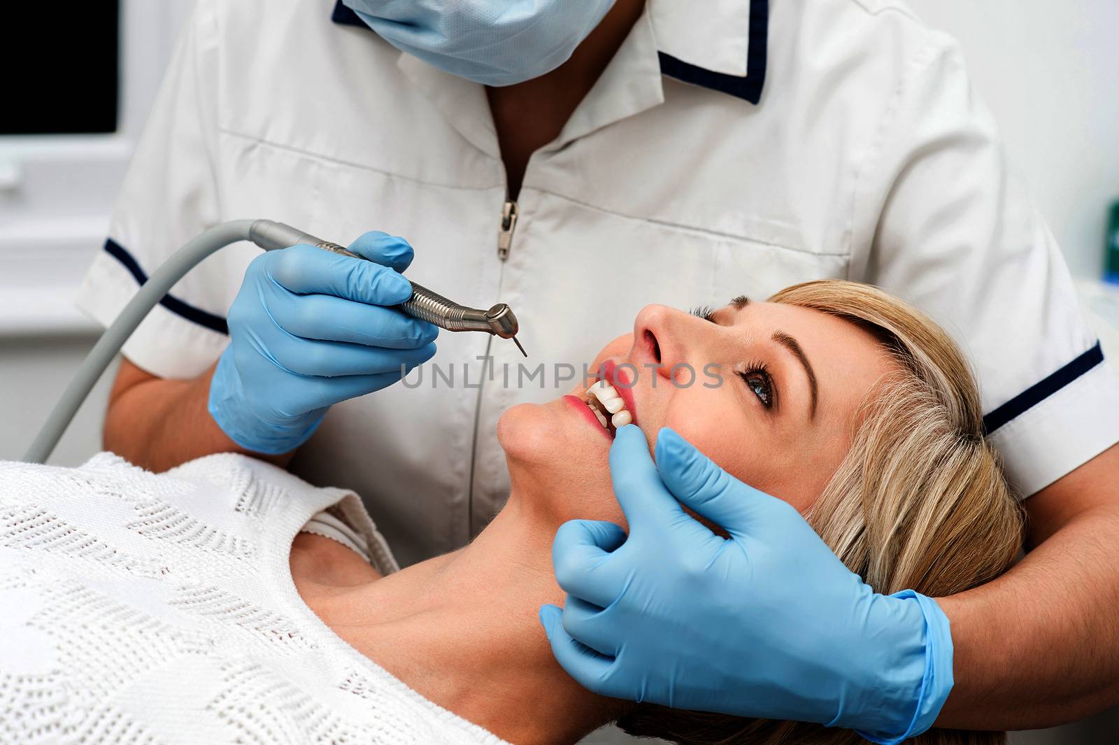 Woman ready for a teeth whitening. by stockyimages