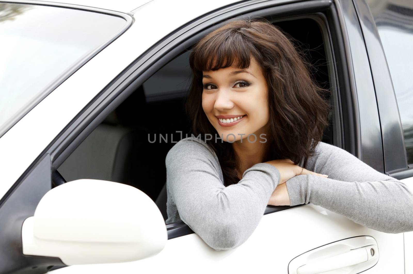 Pretty girl in a car