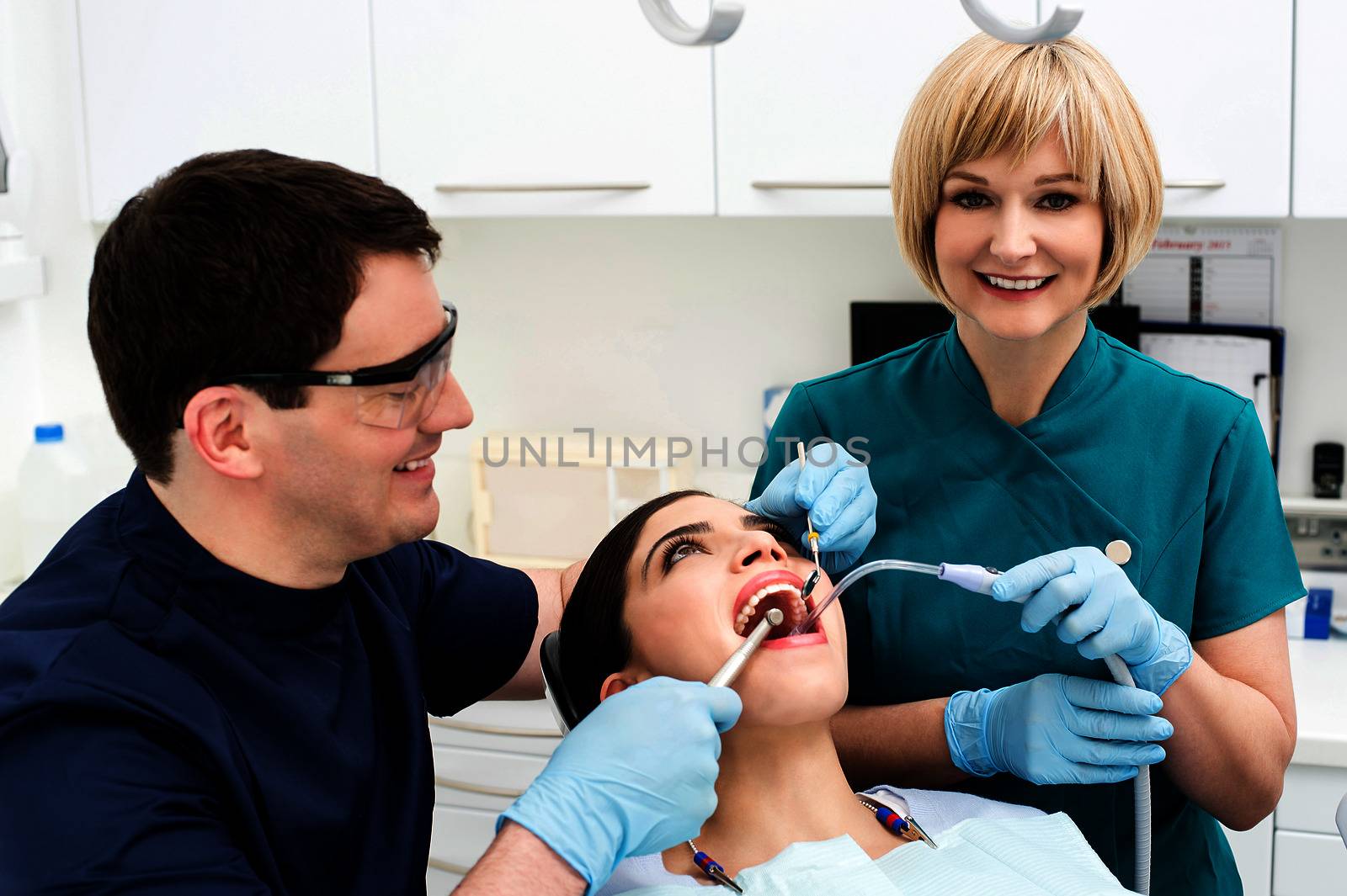 Young woman patient undergoing a dental check