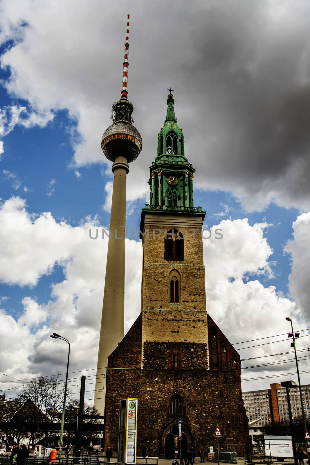 BERLIN - APRIL 4: the church of St. Mary's church and the Tv tower behind on April 4, 2015 in Berlin, Germany