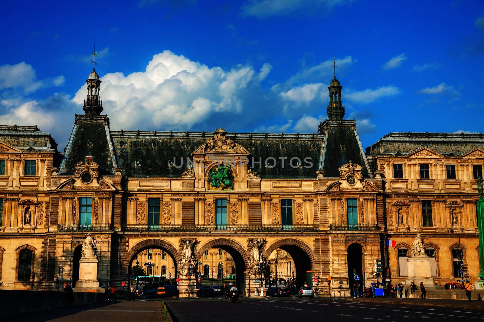 PARIS - OCTOBER 9: Entrance to the Louvre on October 9, 2014 in Paris, France. The Louvre Museum is one of the world's largest museums and a historic monument and a central landmark of Paris.