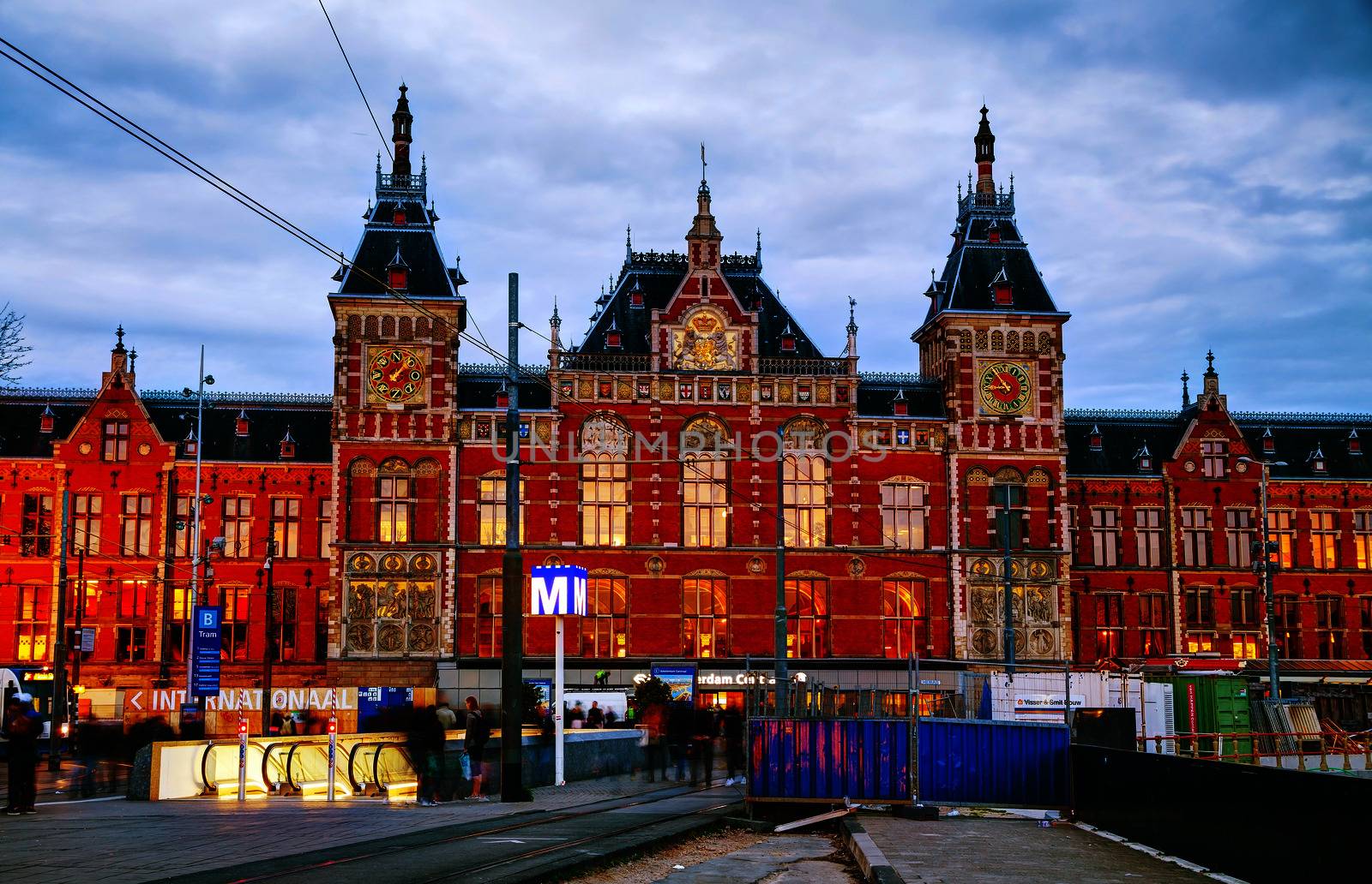 AMSTERDAM - APRIL 16: Amsterdam Centraal railway station on April 16, 2015 in Amsterdam. Amsterdam Centraal is the largest railway station of Amsterdam, Netherlands, and a major national railway hub.