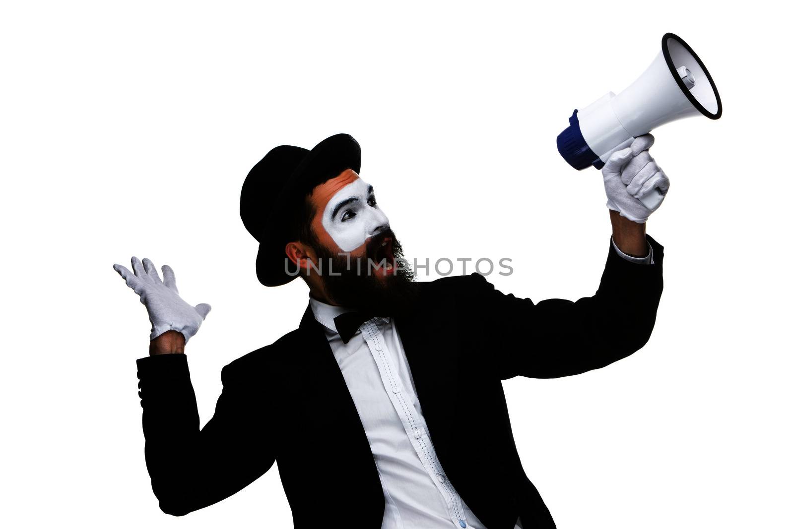 Man  with a face mime screaming into a megaphone, isolated on white background. concept of effective communication