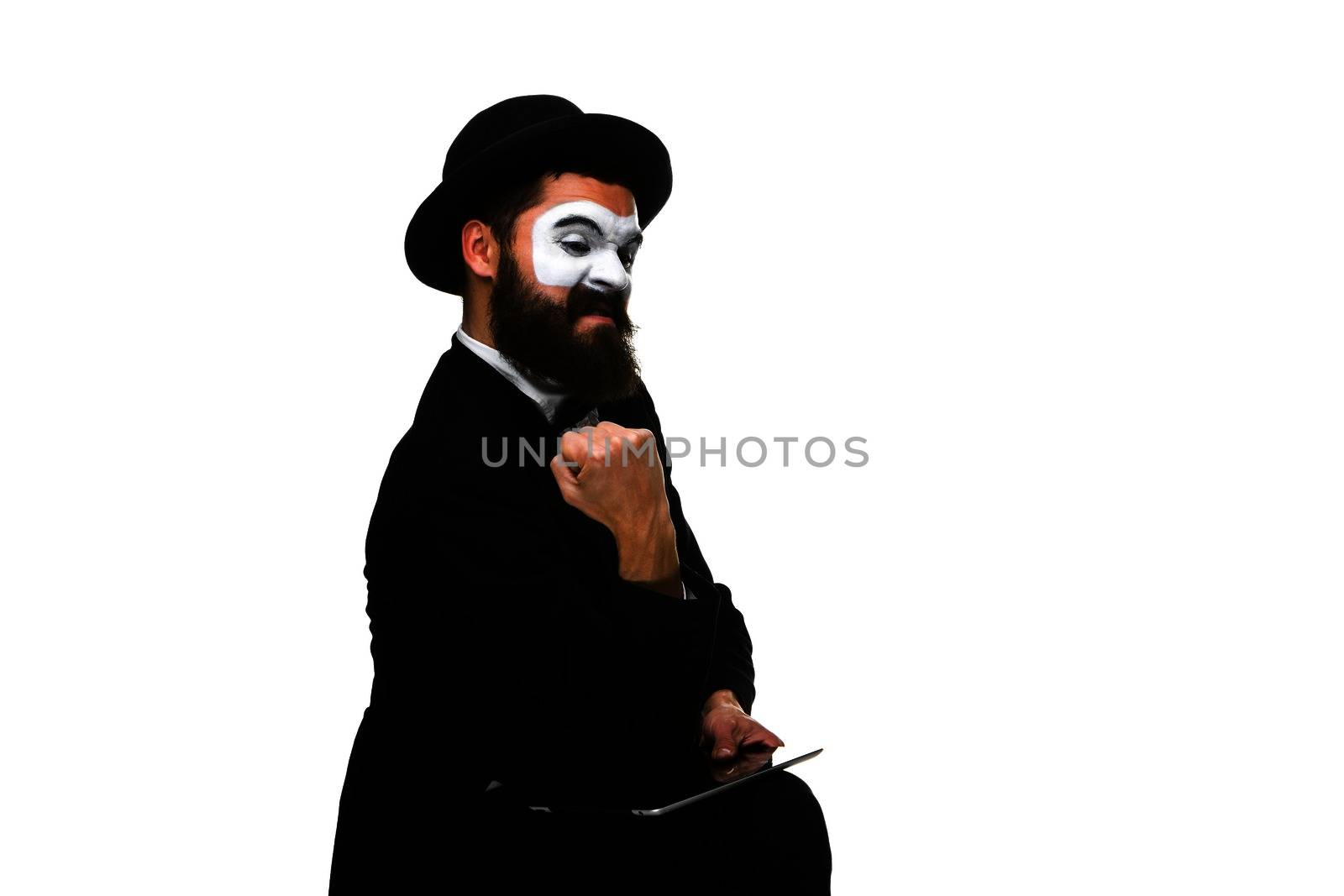 Mime sa businessman has stress because of computer problem. Isolated on white.