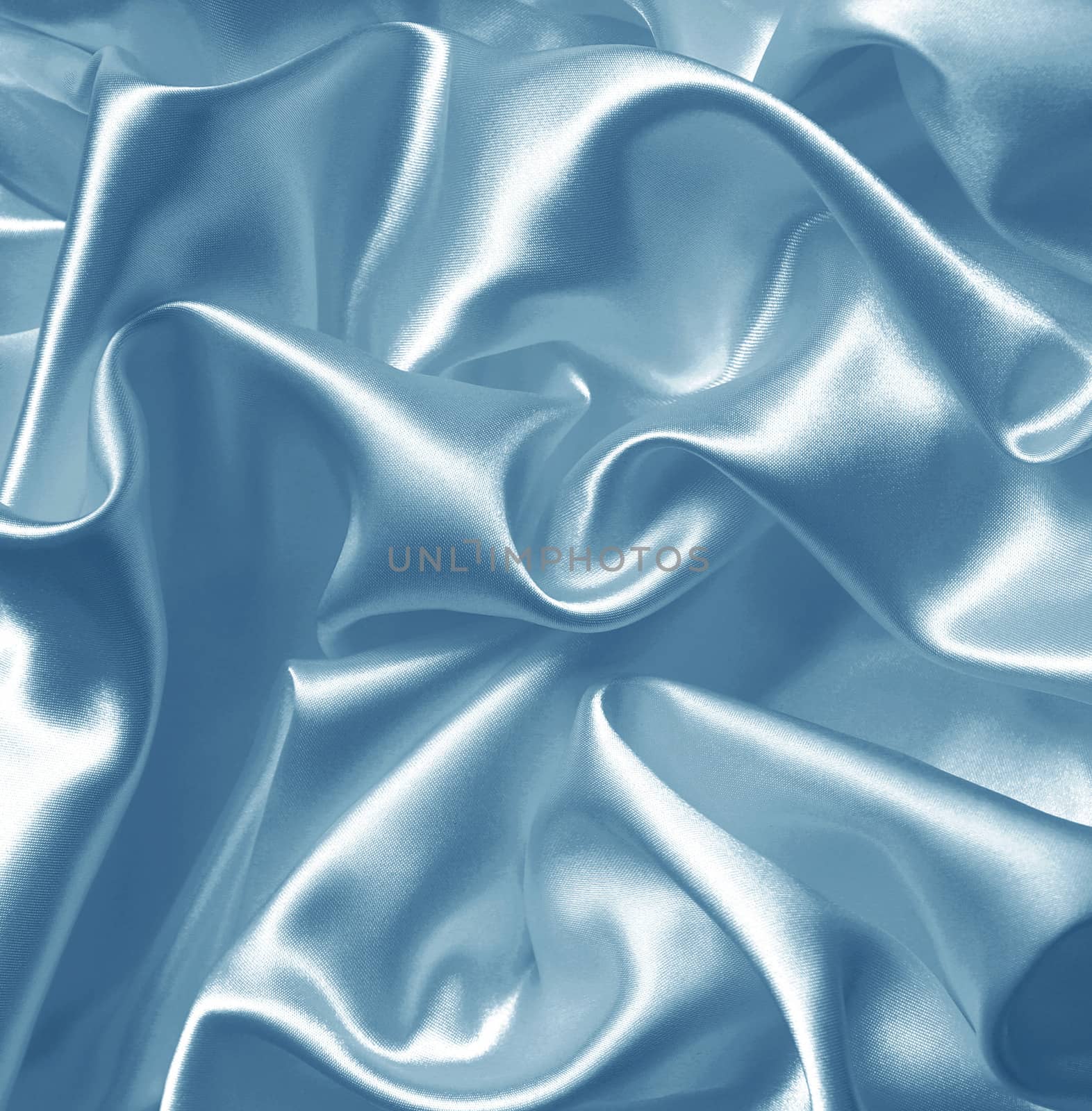 Smooth elegant blue silk or satin as background  by oxanatravel