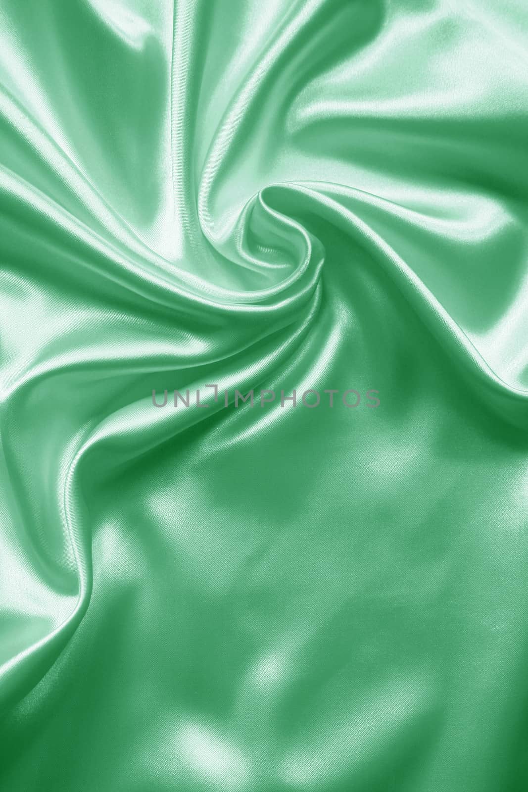 Smooth elegant green silk or satin as background  by oxanatravel