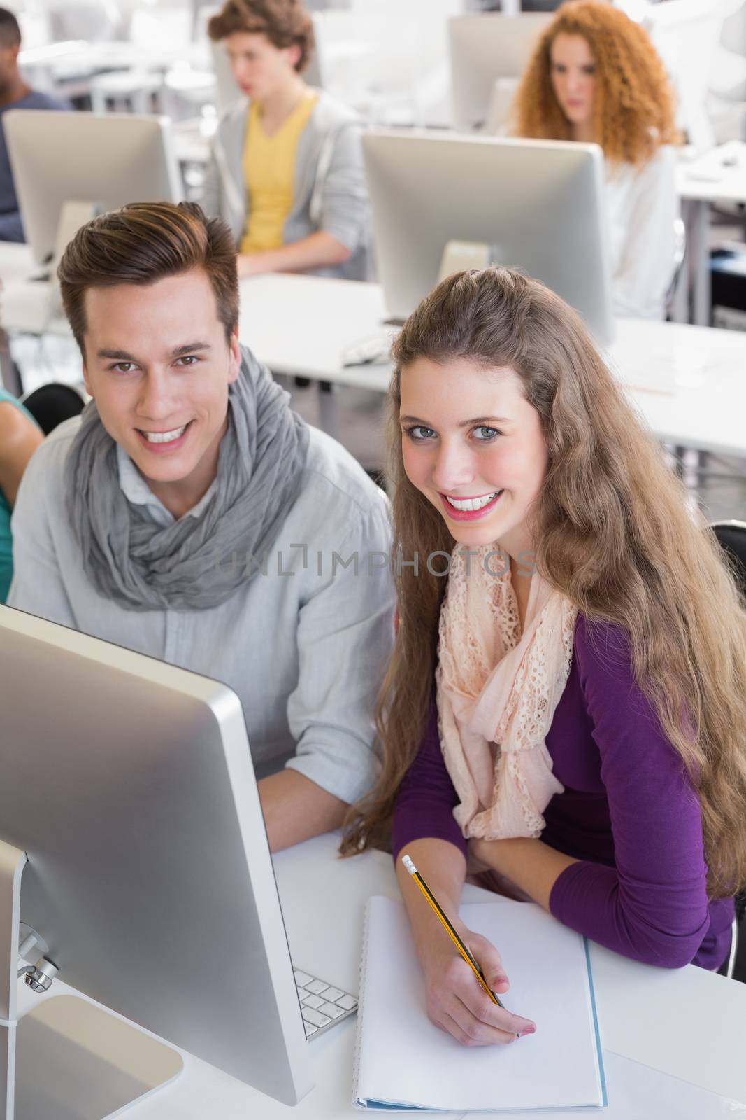 Students working in computer room at the college