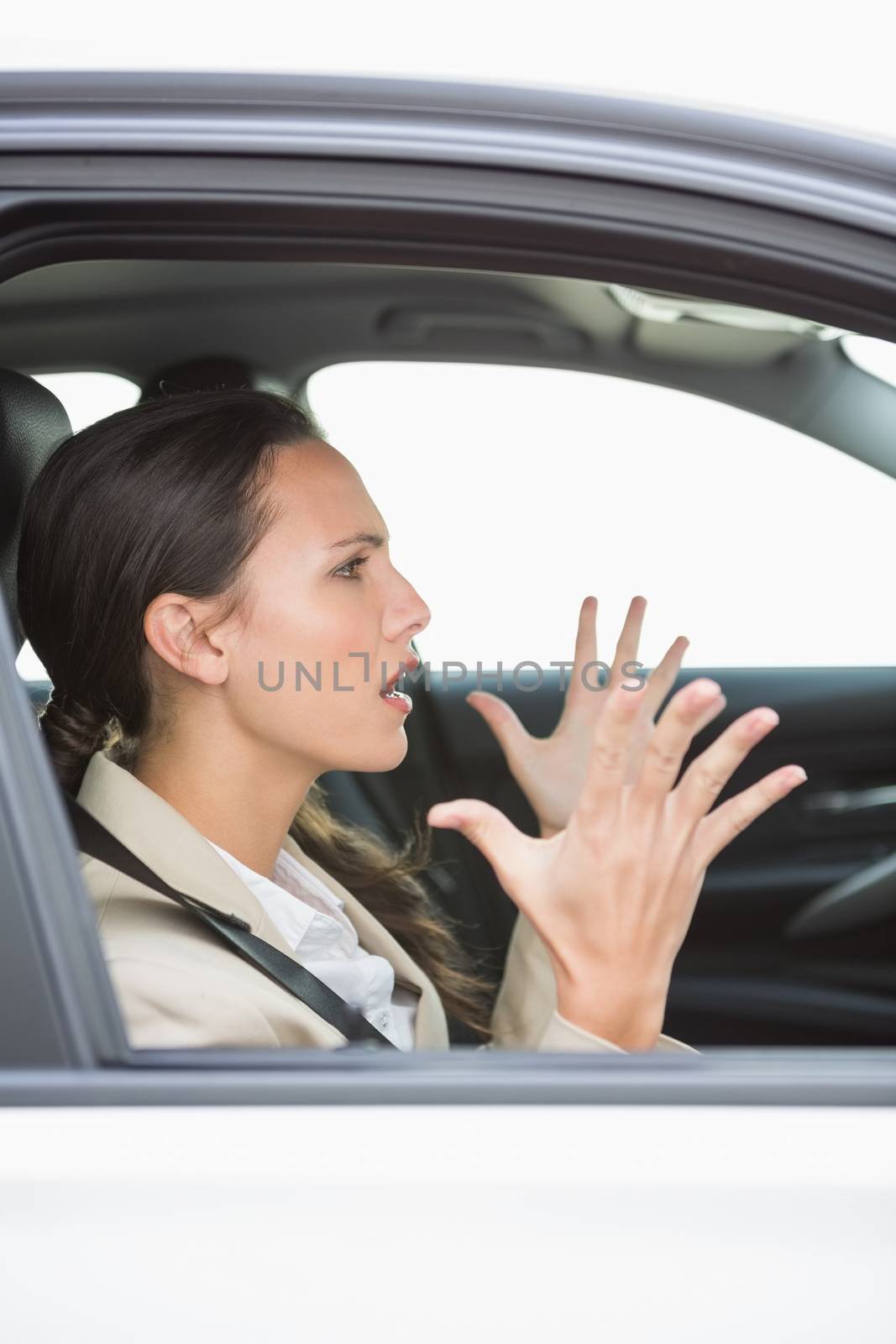 Young woman experiencing road rage by Wavebreakmedia