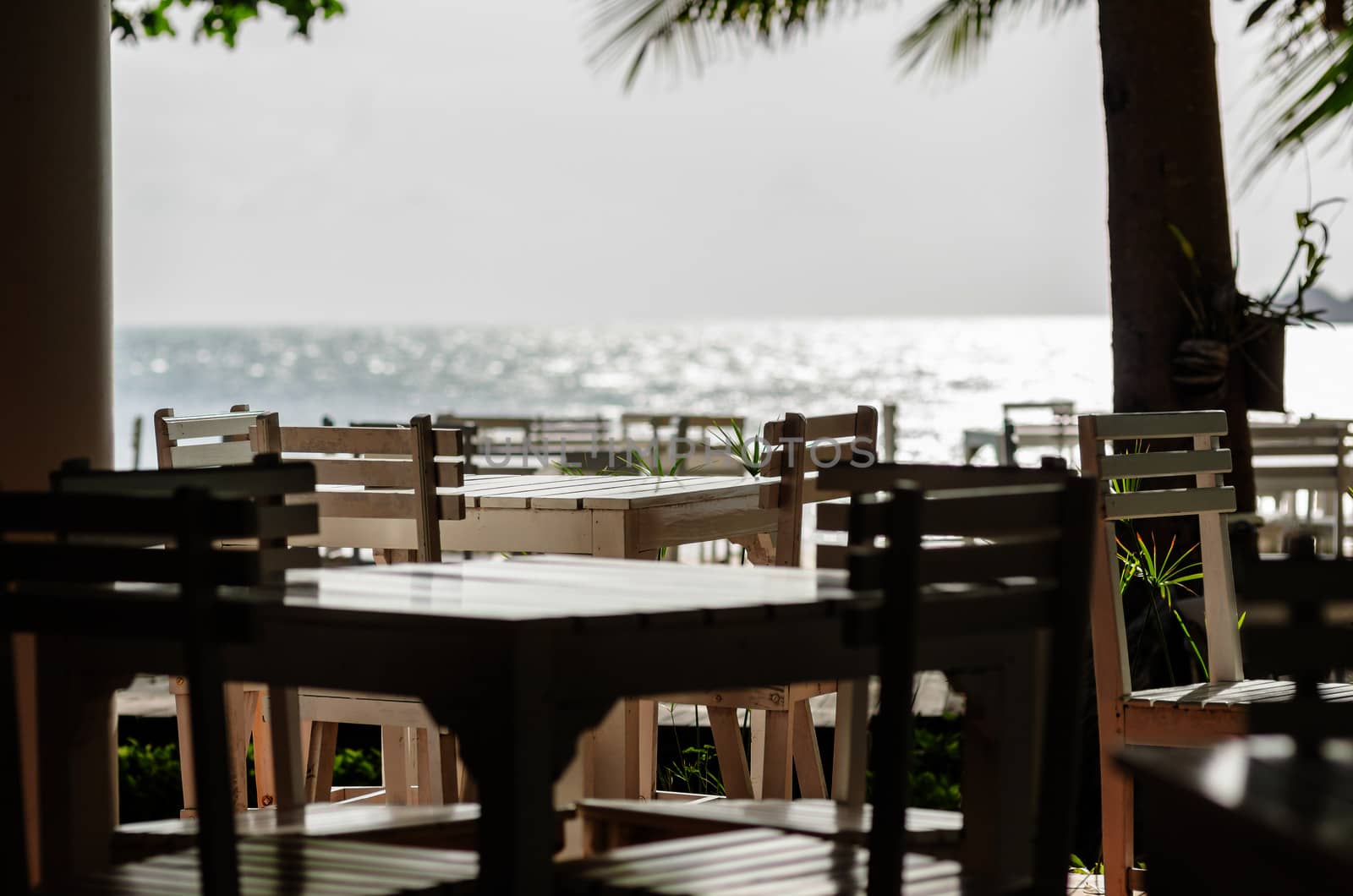 Wood dock White chair and table in Koh Samet Thailand