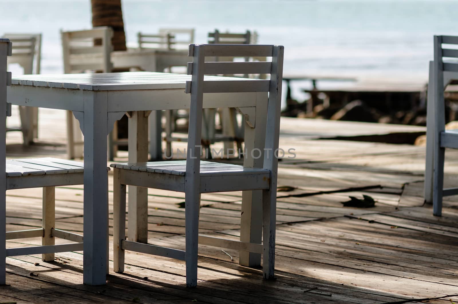 Wood dock White chair and table in Koh Samet Thailand