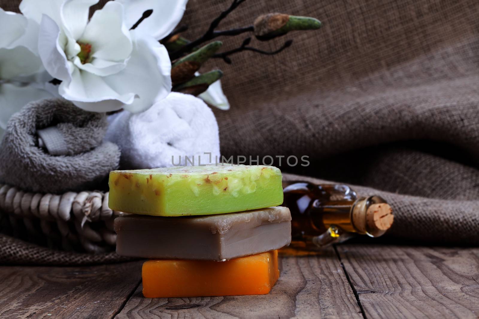 colorful handmade soap bars, on wooden background