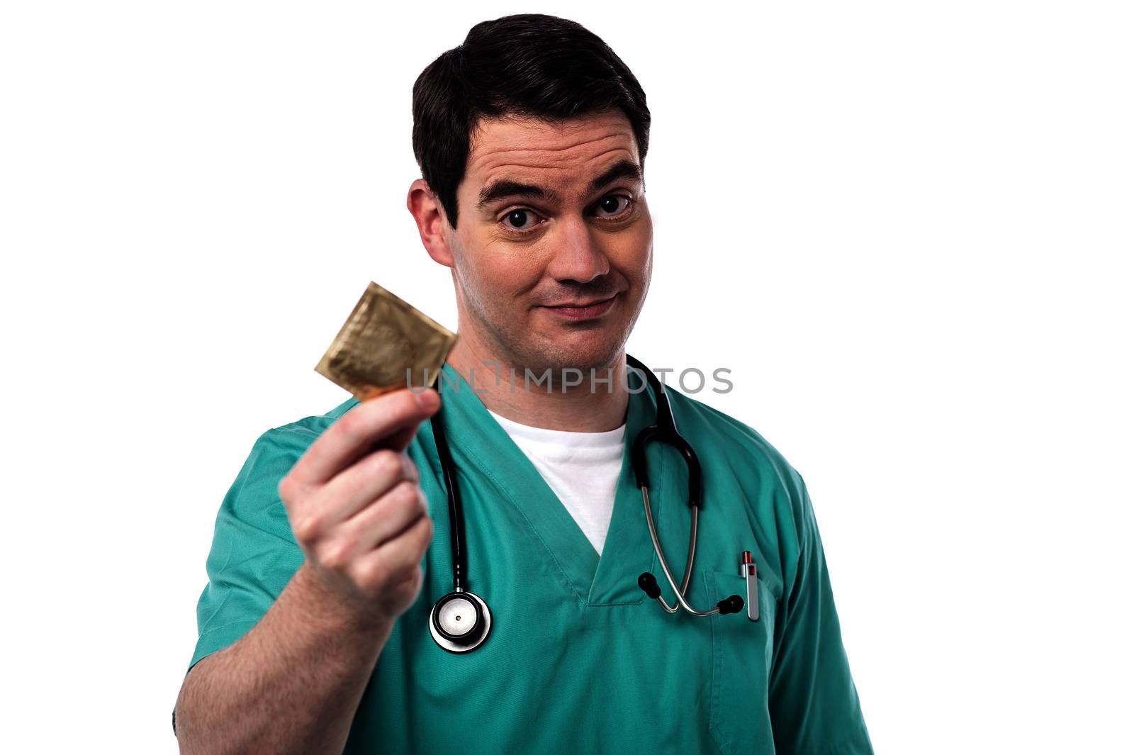 Male doctor showing condoms for aids prevention