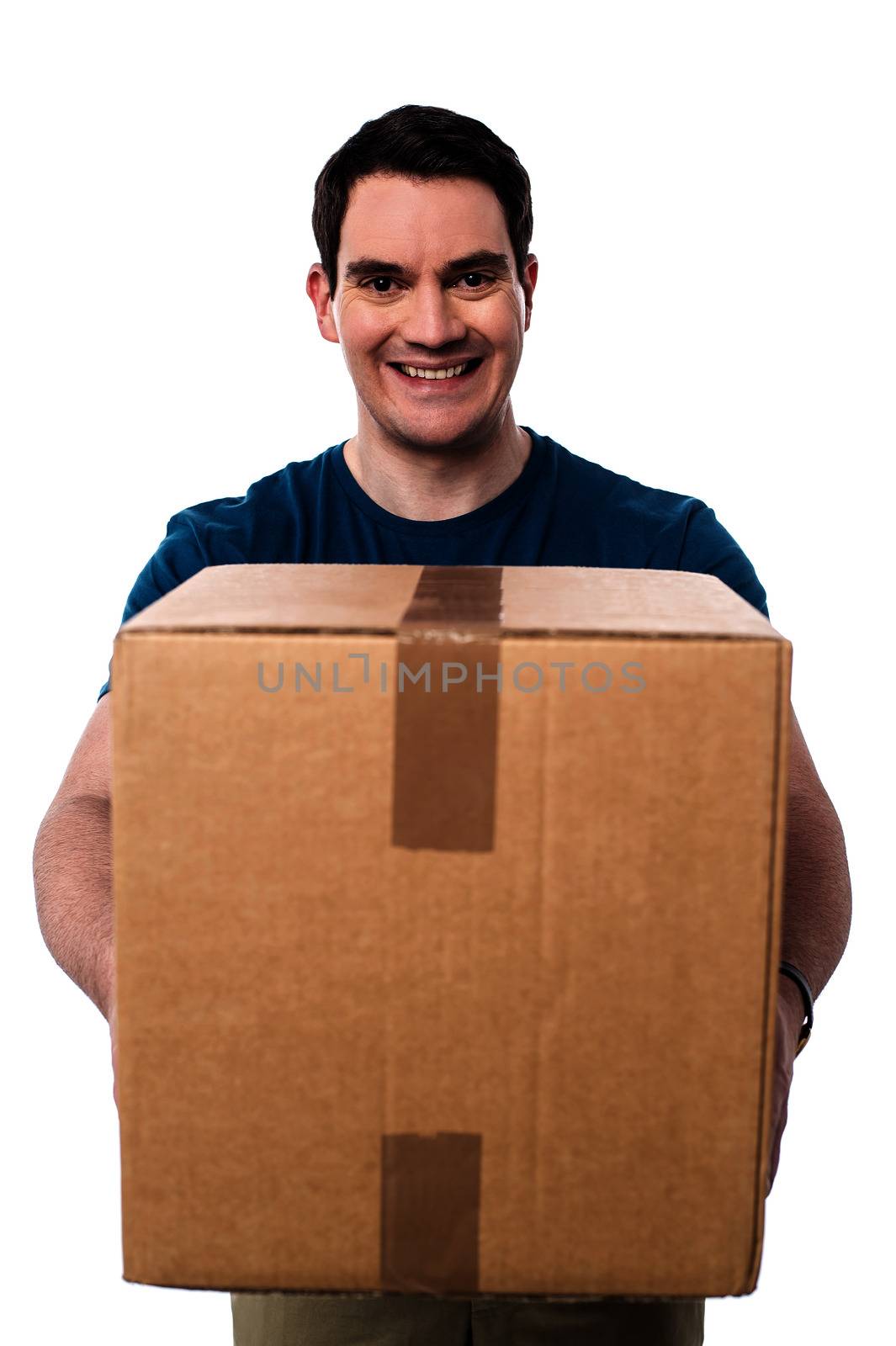 Casual smiling man delivering  cardboard box