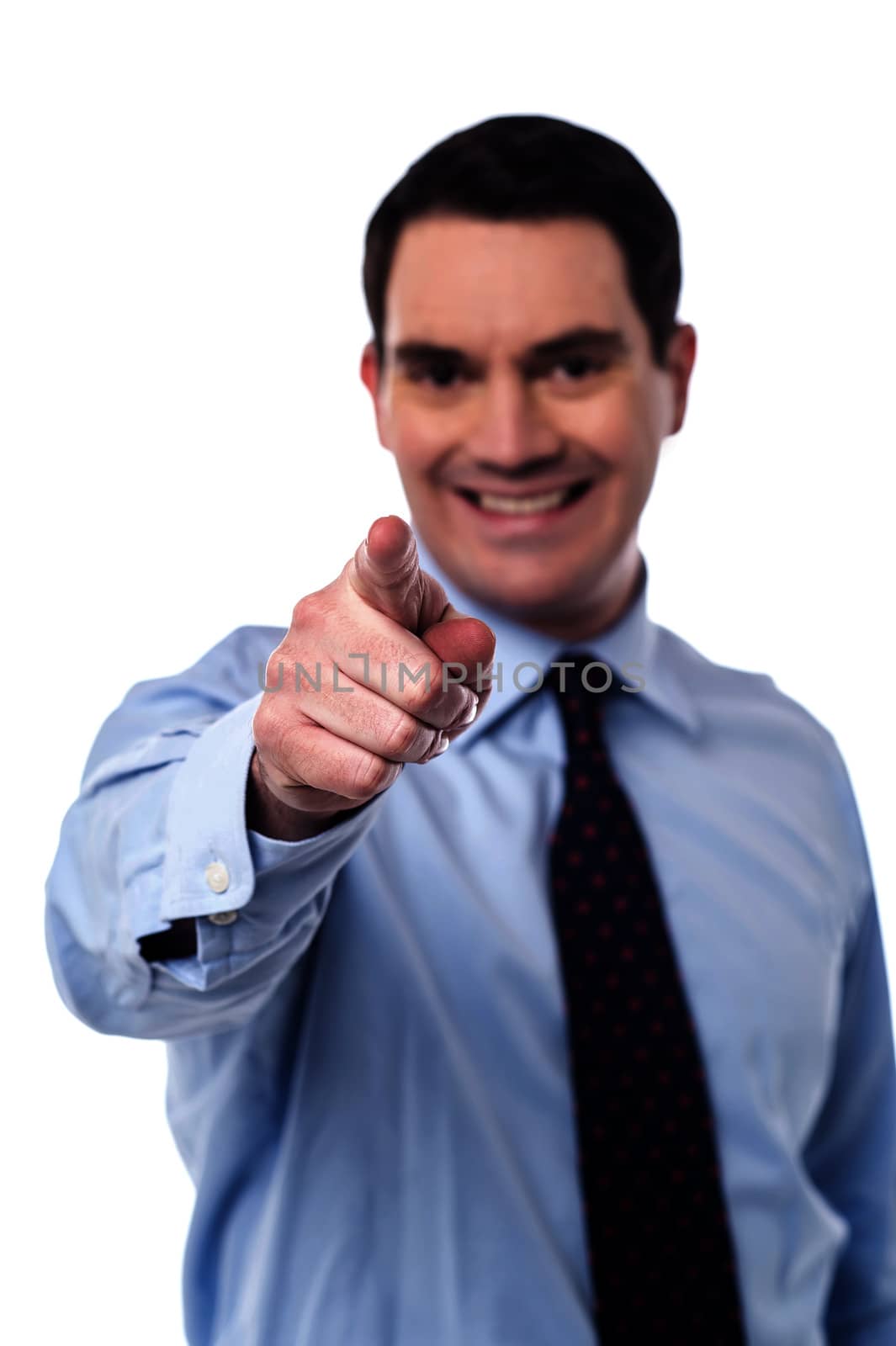 Male executive pointing his finger towards camera