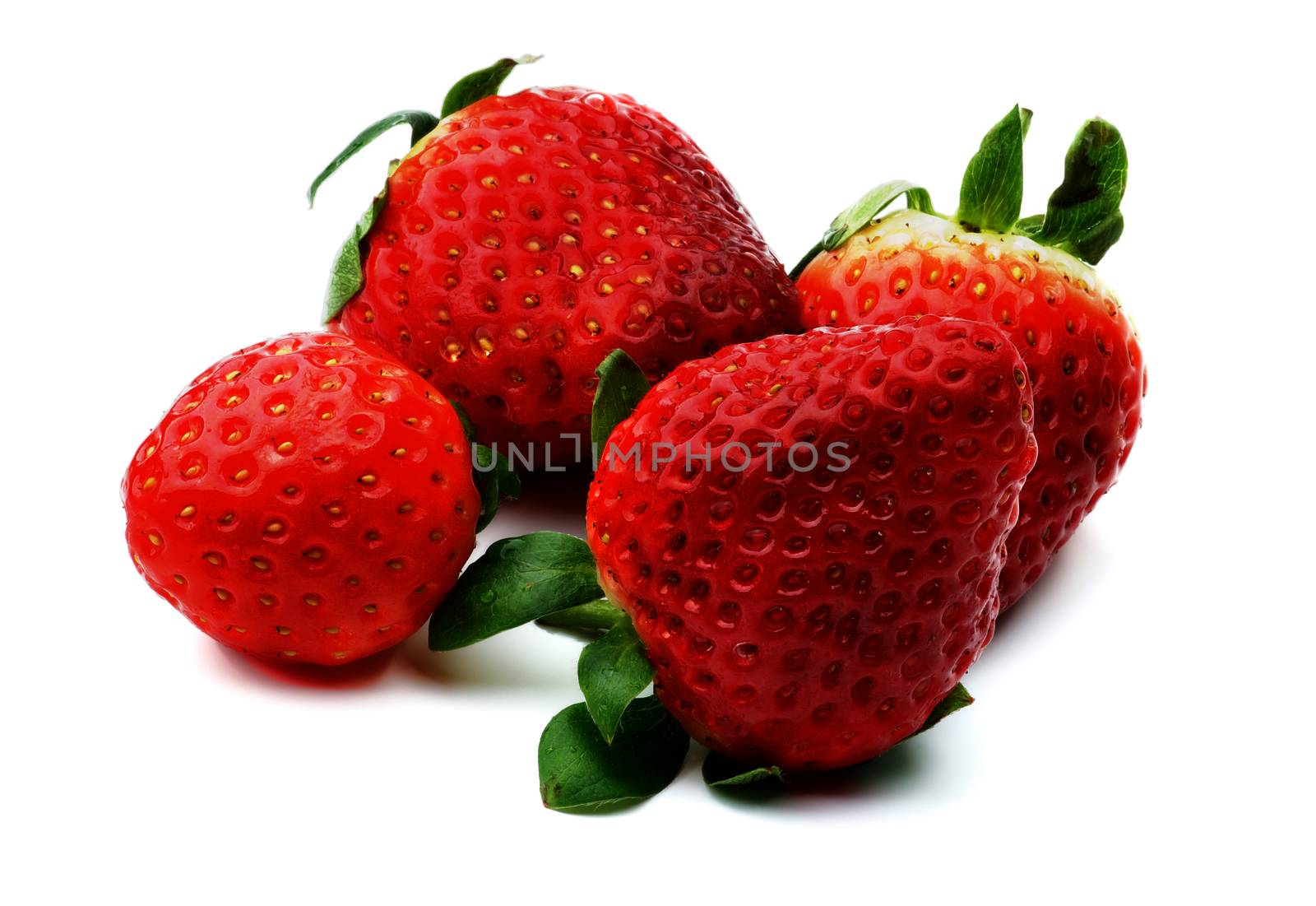 Four Ripe Raw Strawberries isolated on white background