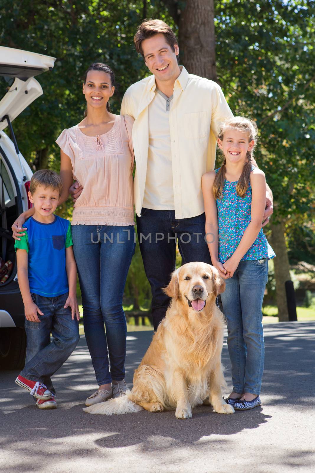 Happy family getting ready for road trip by Wavebreakmedia