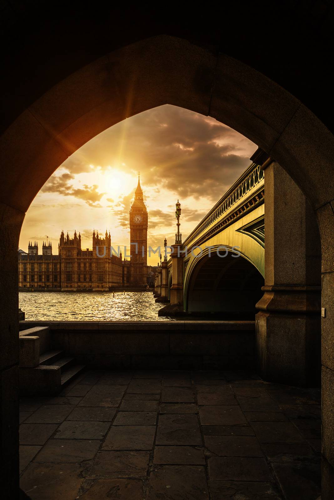 Big Ben through the pedestrian tunnel at sunset by vwalakte