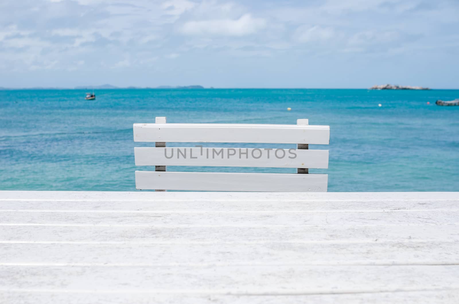 Wood dock White chair and table in Koh Samet Thailand