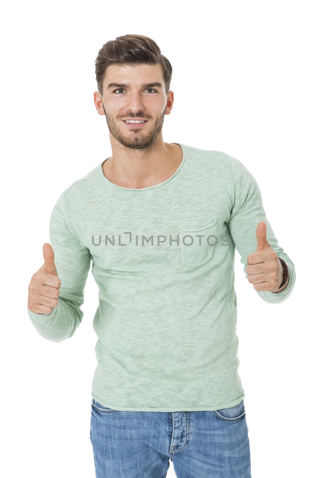 Puzzled handsome young man scratching his head with his hand as he looks at the camera with an uncertain perturbed expression, isolated on white