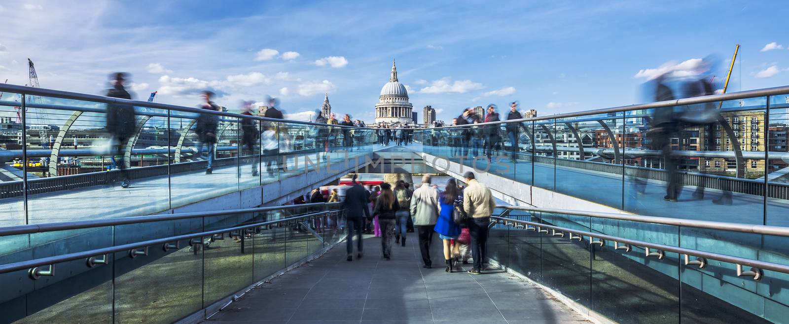 the Millennium footbridge looking towards St. Paul's Cathedral, panoramic view.