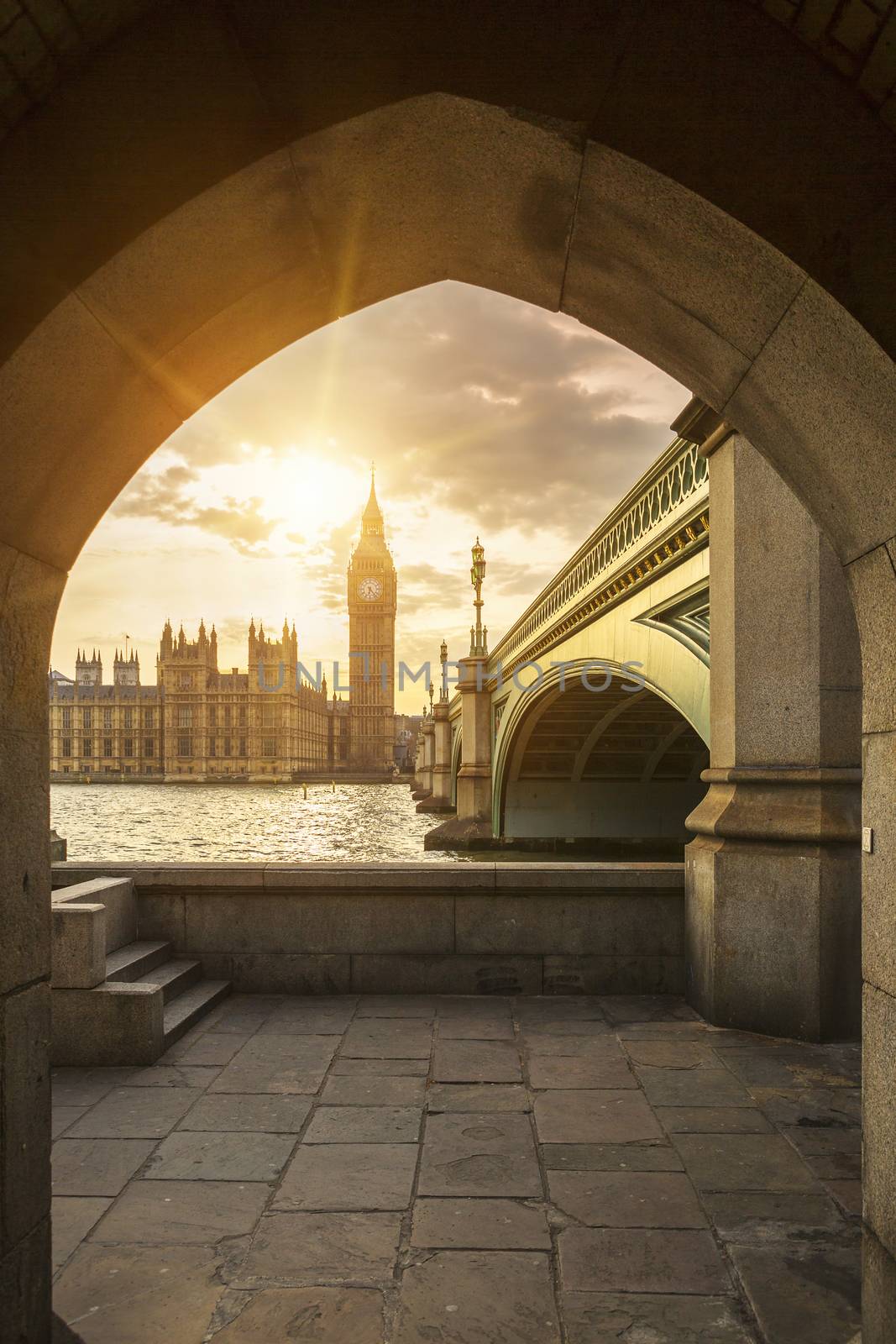 Big Ben through the pedestrian tunnel at sunset by vwalakte