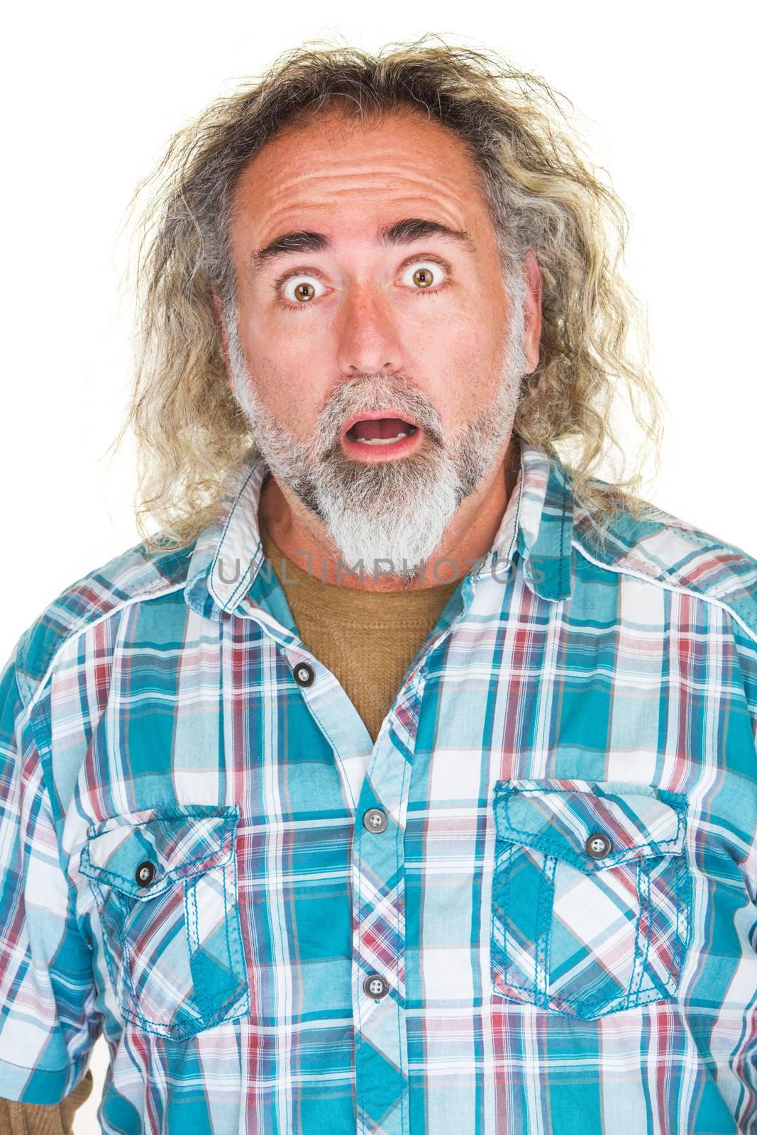 Surprised mature man with beard and long hair