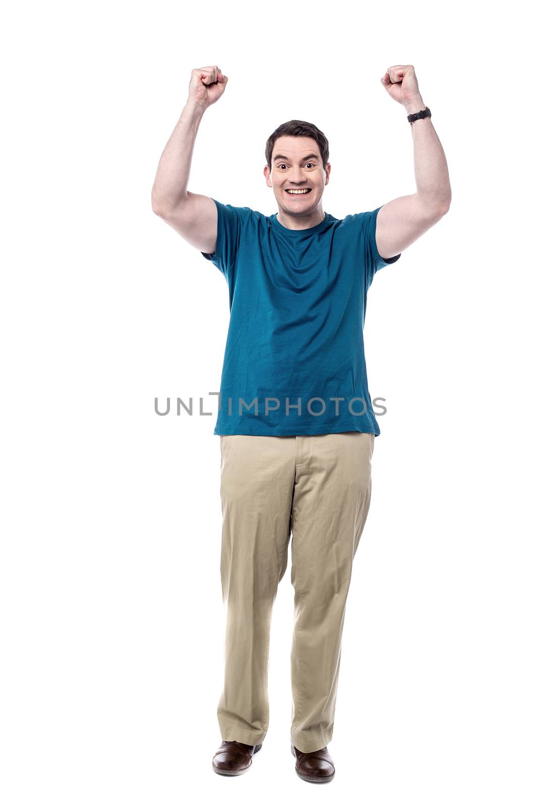 Cheerful man celebrating his victory