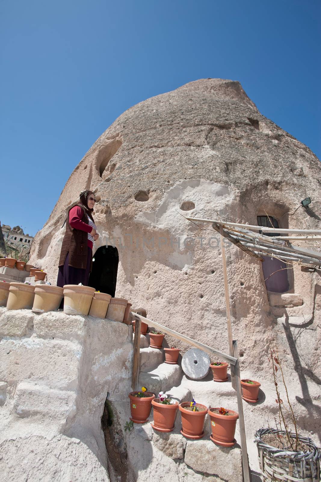 Turkish Woman at her Cave Home in Cappadocia by Creatista