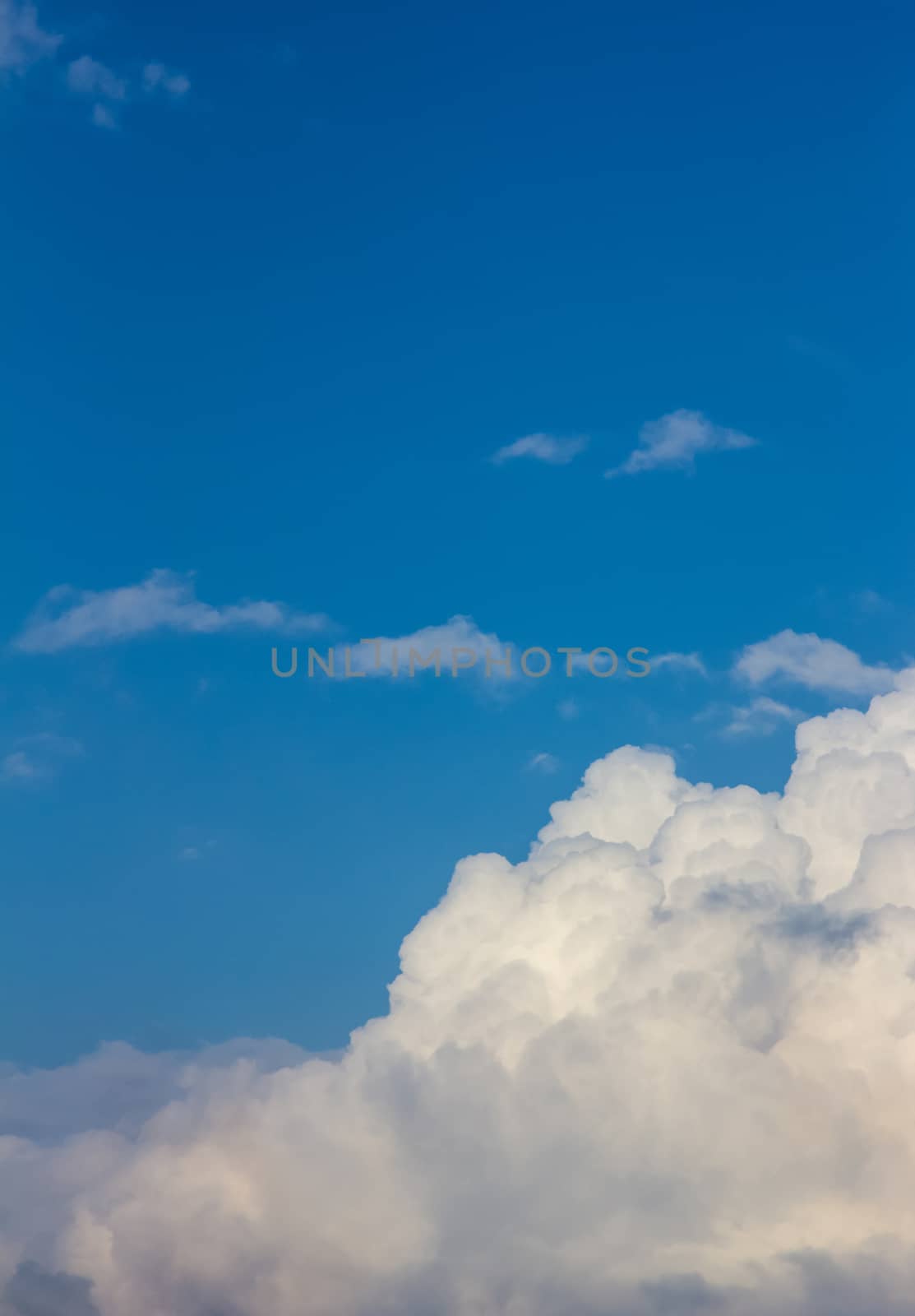 Soft clouds over view from airplane flying