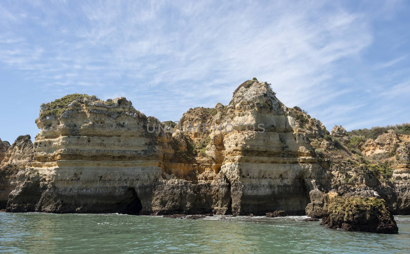 rocks and cliff with stairs and bridge in algarve city lagos in Portugal, the most beautifull coastline of the world