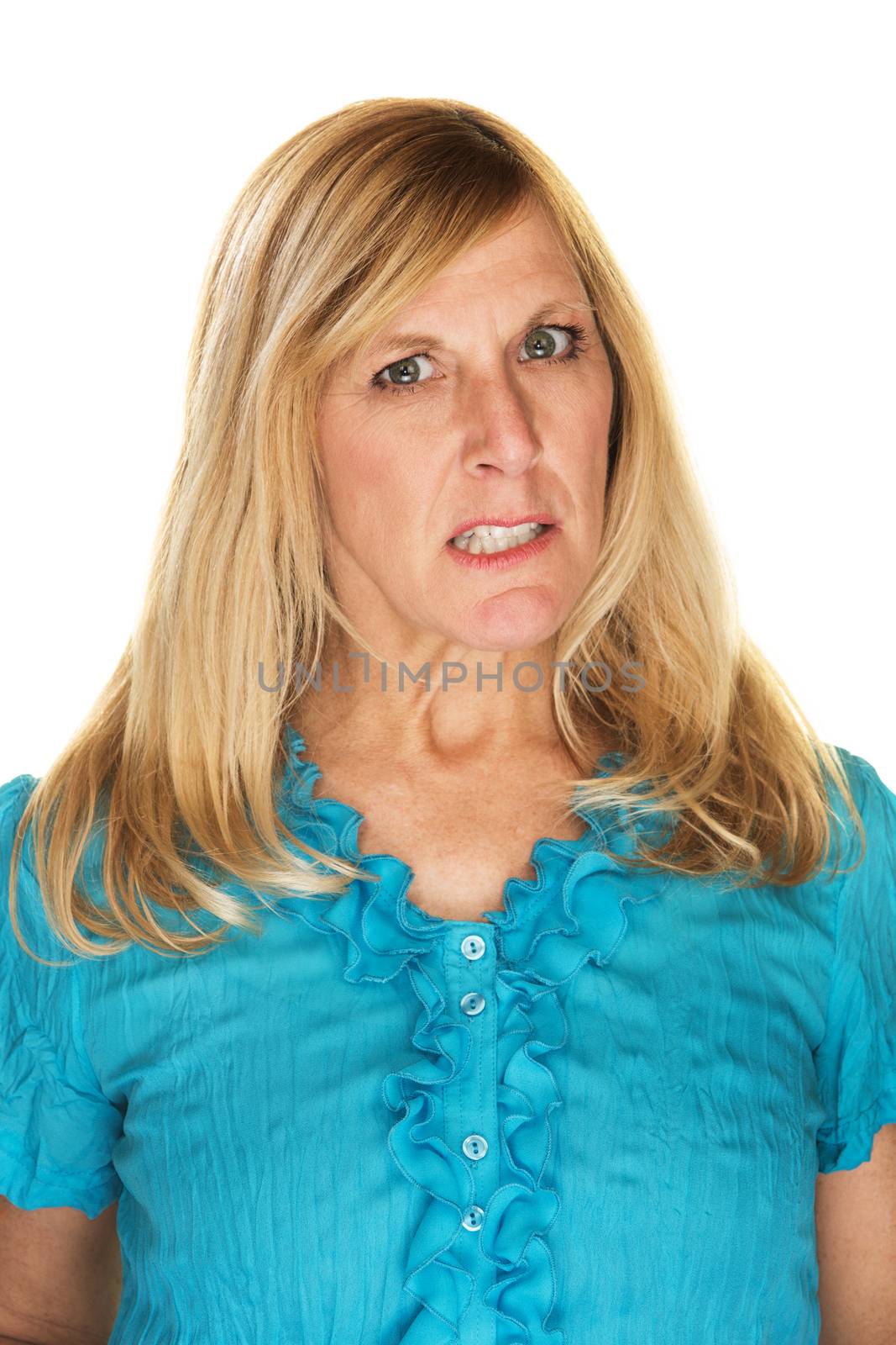 Annoyed lady in blue with clenched teeth