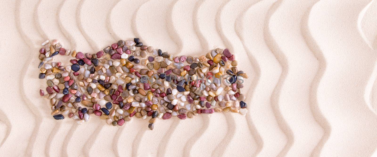 High Angle View of Map of Turkey Shaped from Colored Polished Pebbles on Wavy Beach Sand, Panoramic Image with Copy Space