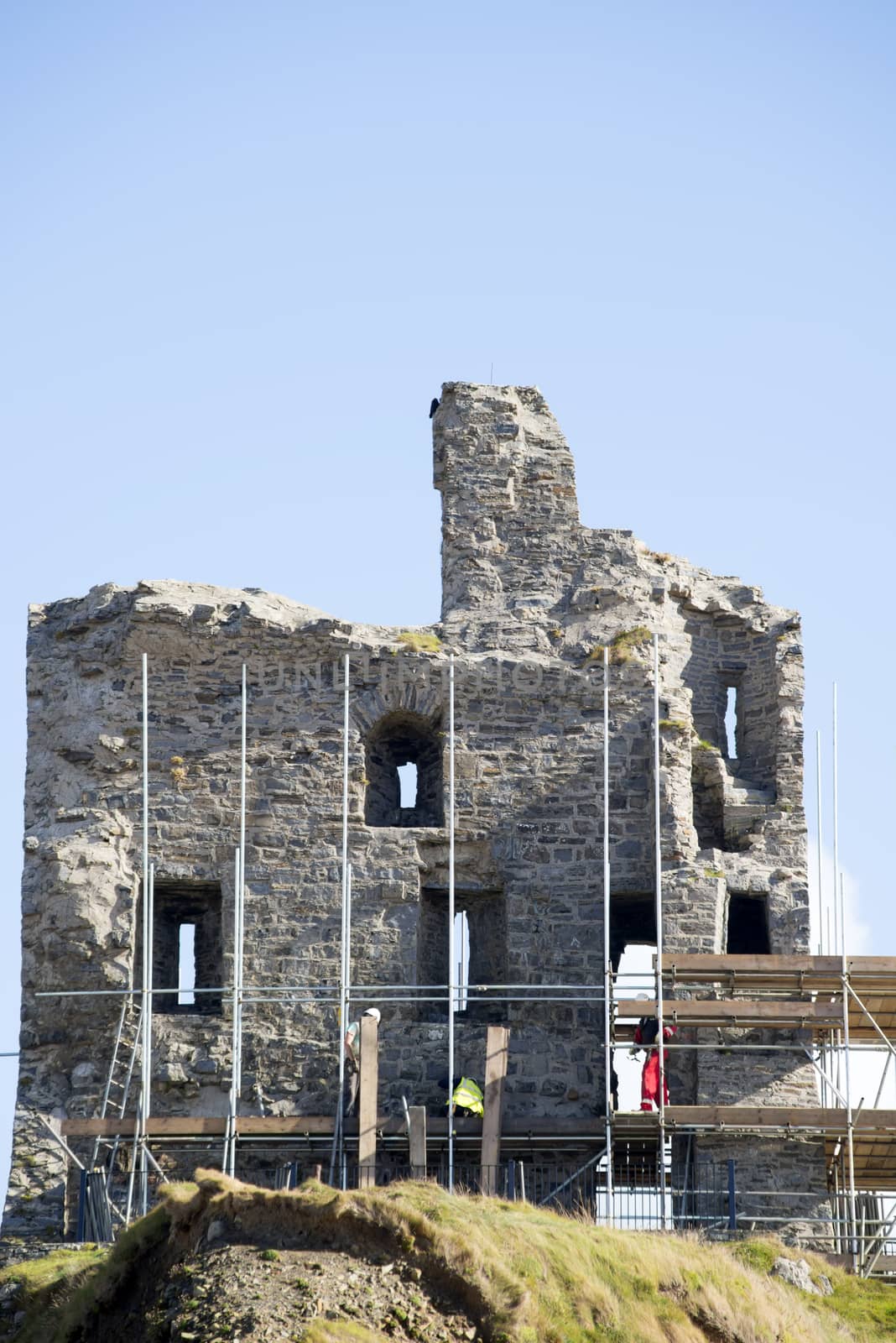 ballybunion castle with work men scafolding by morrbyte