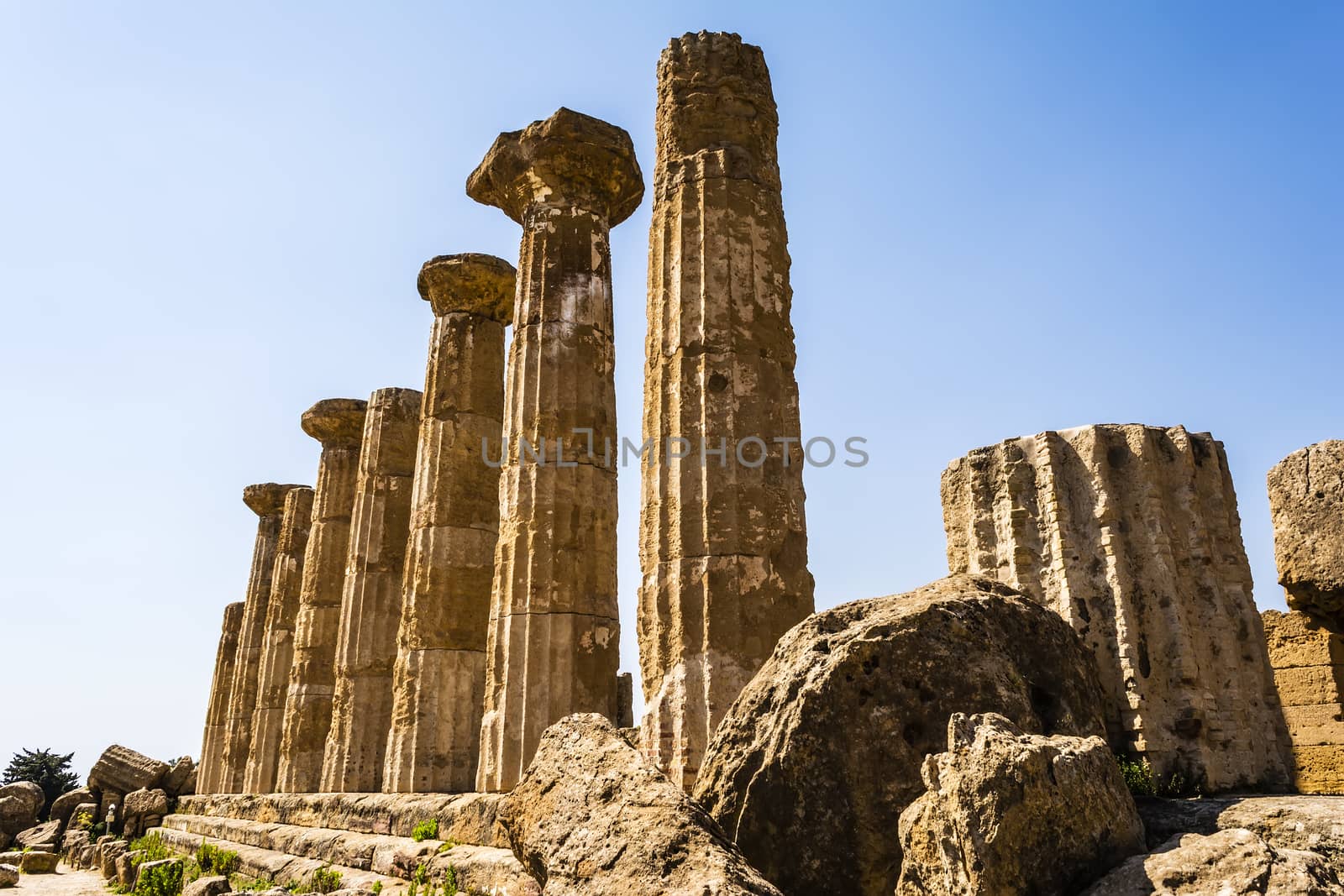 Ancient columns of Hercules Temple at Italy, Sicily, Agrigento. Greek Temples Valley.