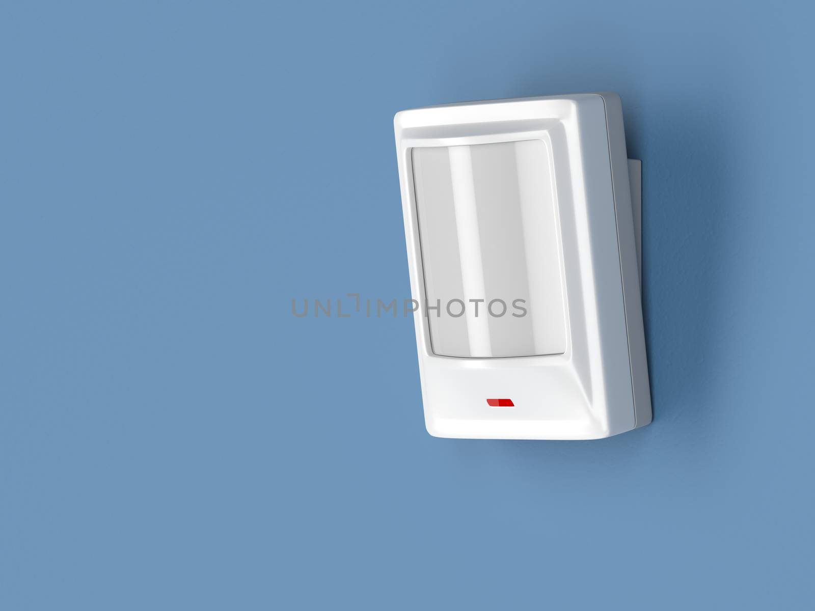 Motion detector attached on blue wall