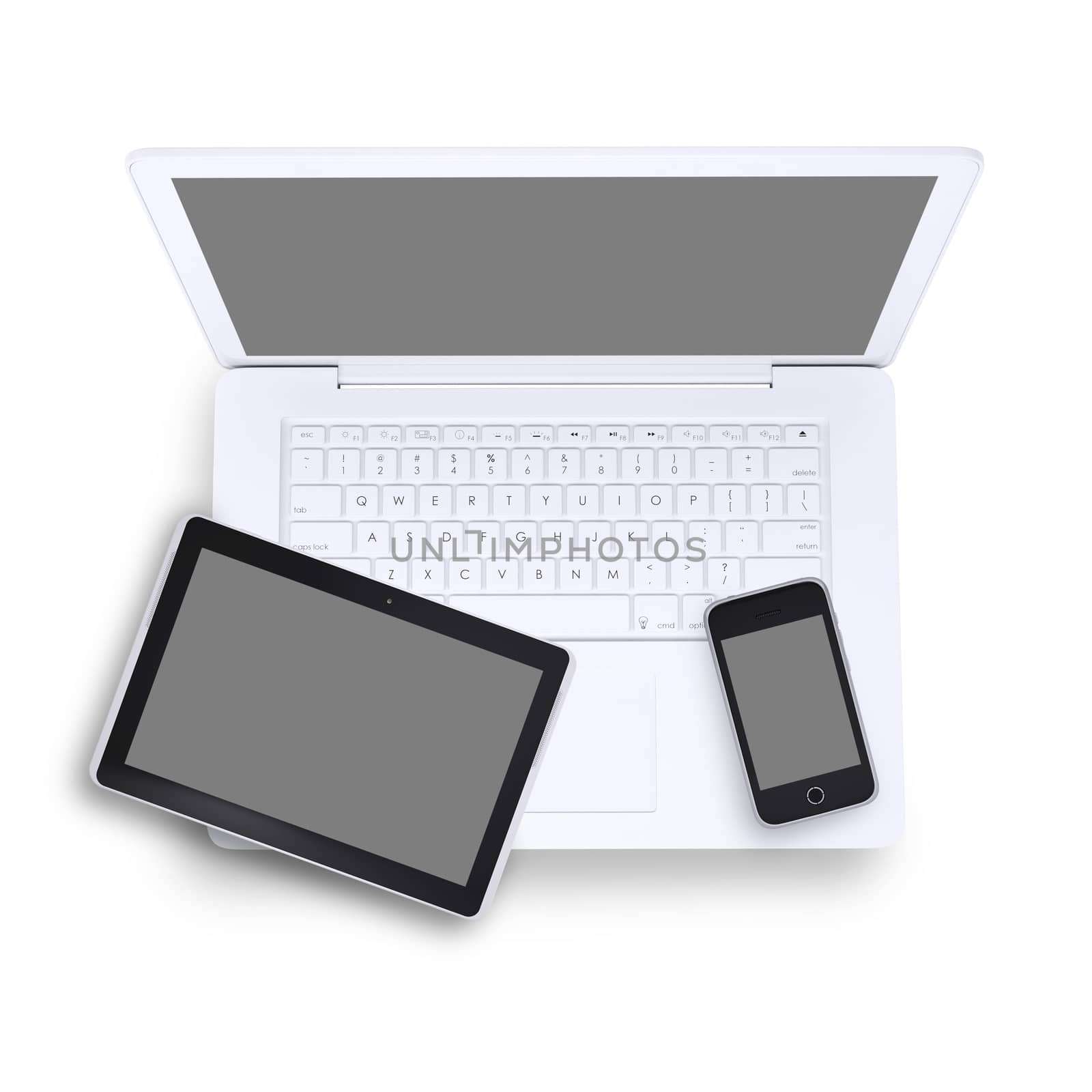 Tablet and mobile phone on laptop in isolated white background, top view