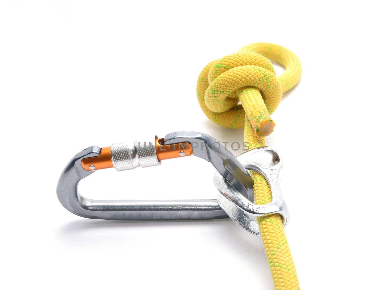 Climbing ascender, rope, carabiner, knot isolated on white. Clim by comet