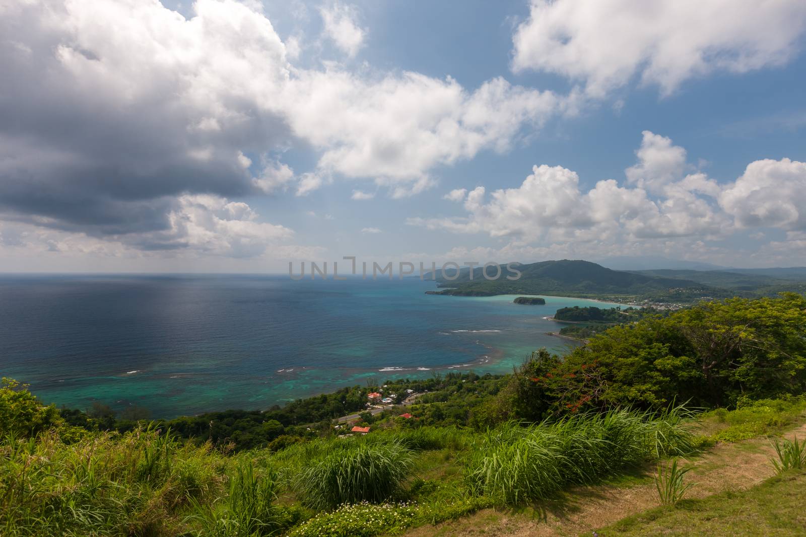 Jamaican Beach A. Caribbean beach on the northern coast of Jamaica, near Dunn's River Falls and the town of Ocho Rios.