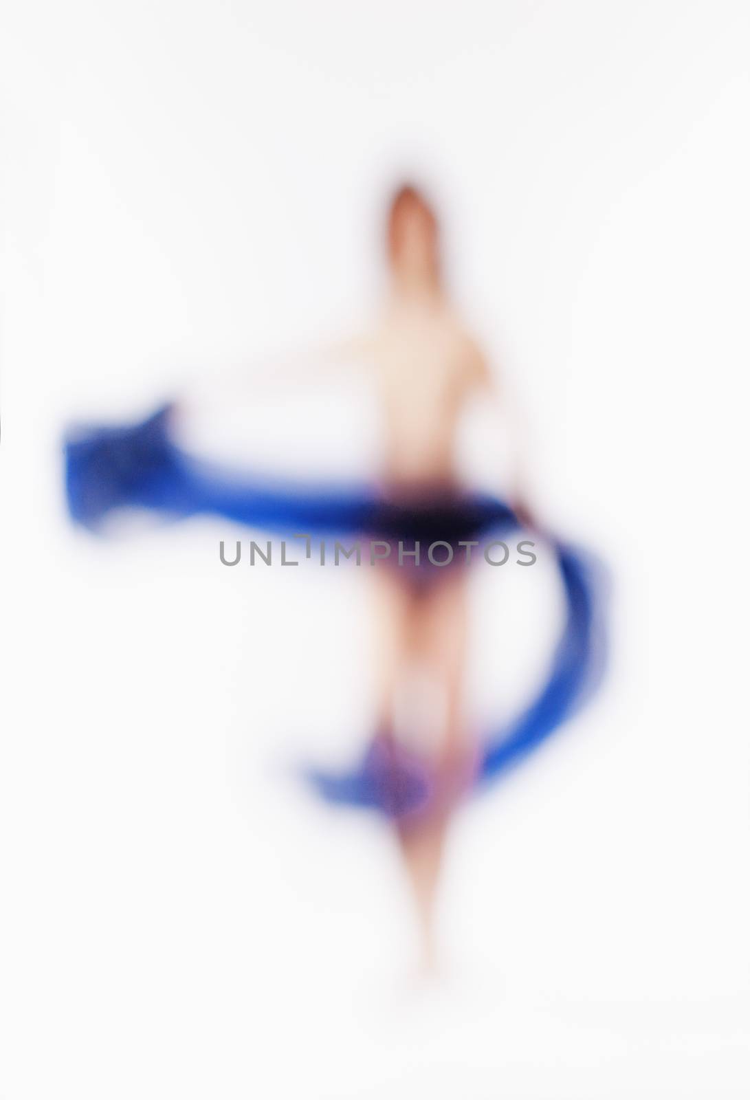 Out of Focus Image of a Woman with Blue Cloth by courtyardpix