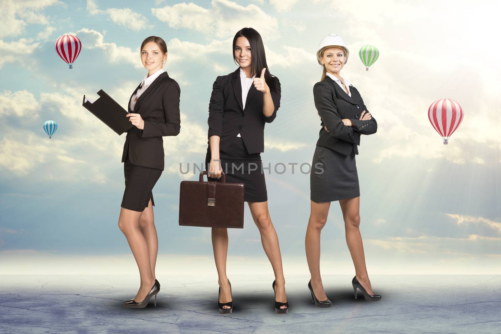 Young attractive business women looking at camera on abstract background
