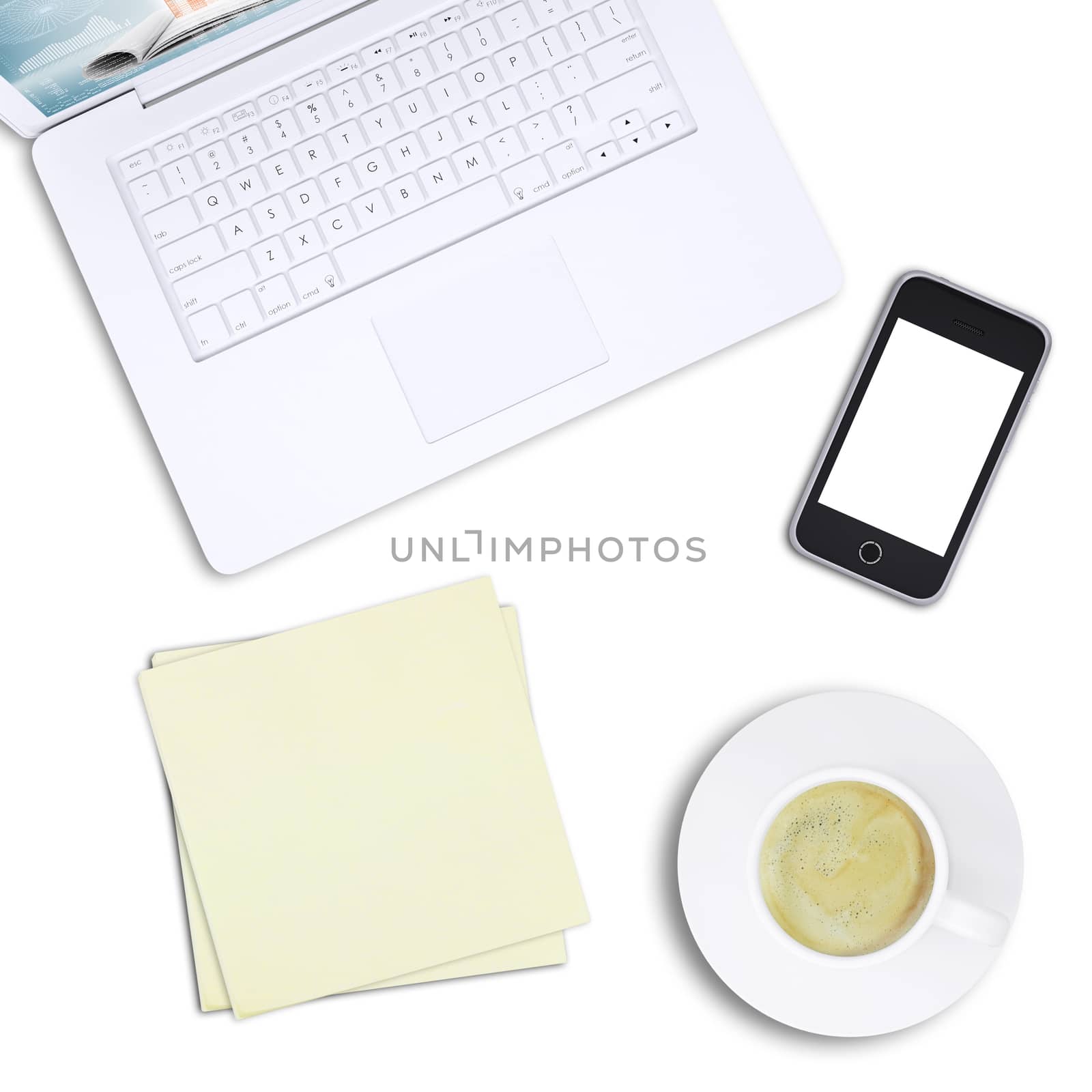 White laptop with note paper and mobile, top view by cherezoff
