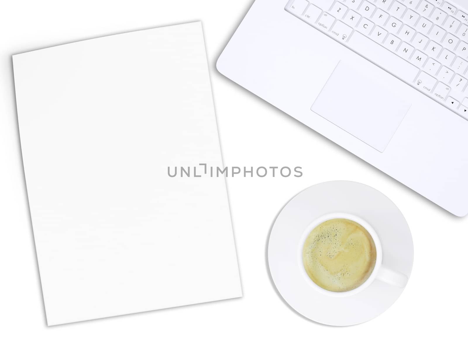 White laptop and coffee cup on isolated white background, top view. Closed up