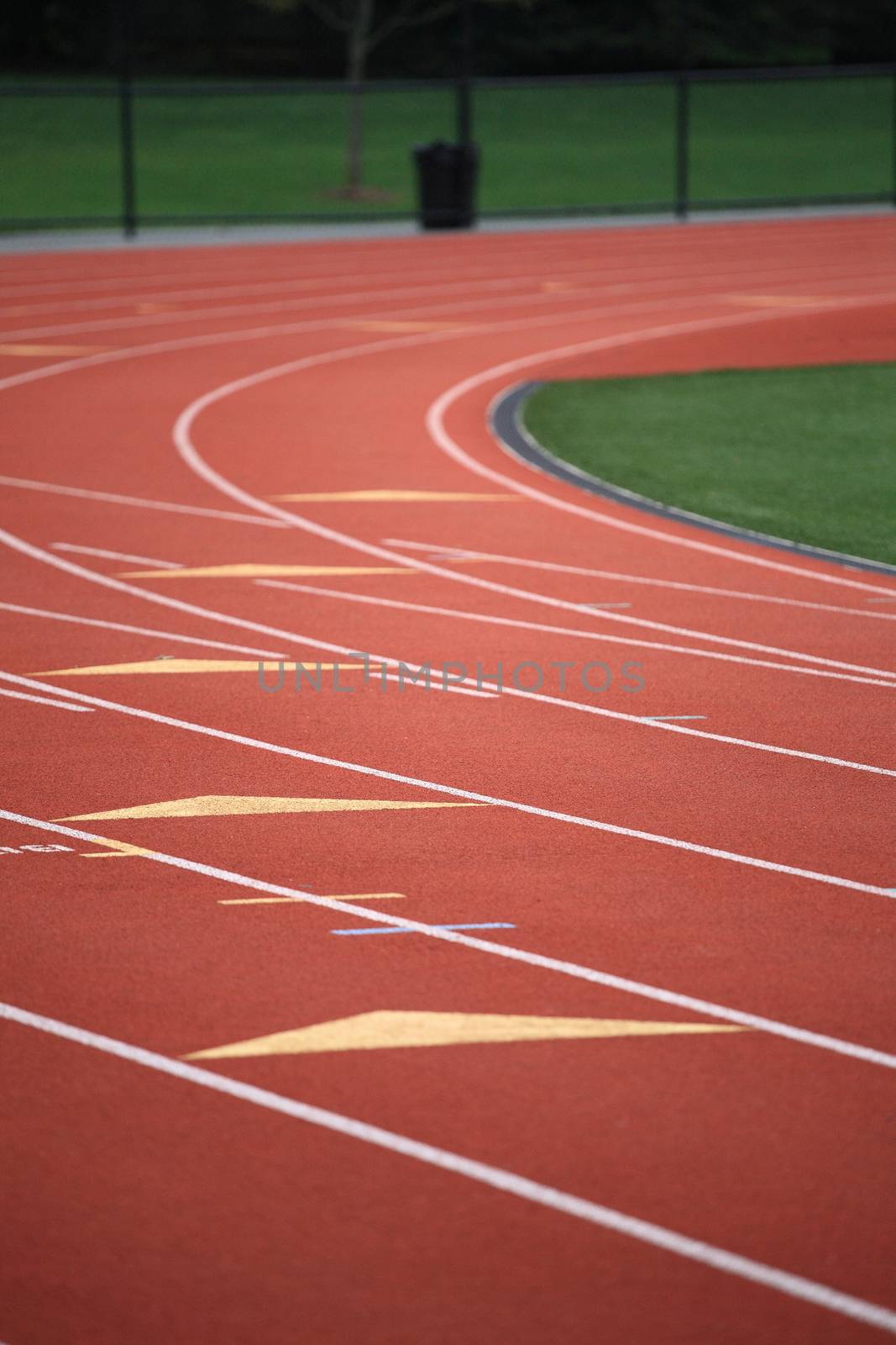 Running Track - the curve of a lined runners track.