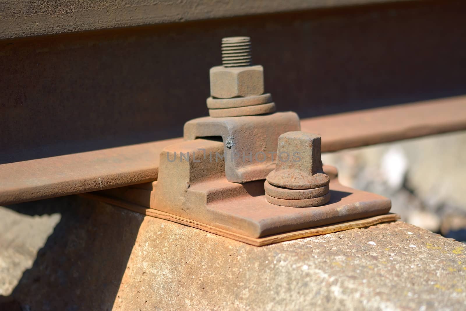 macro shot of rusty bolt by comet