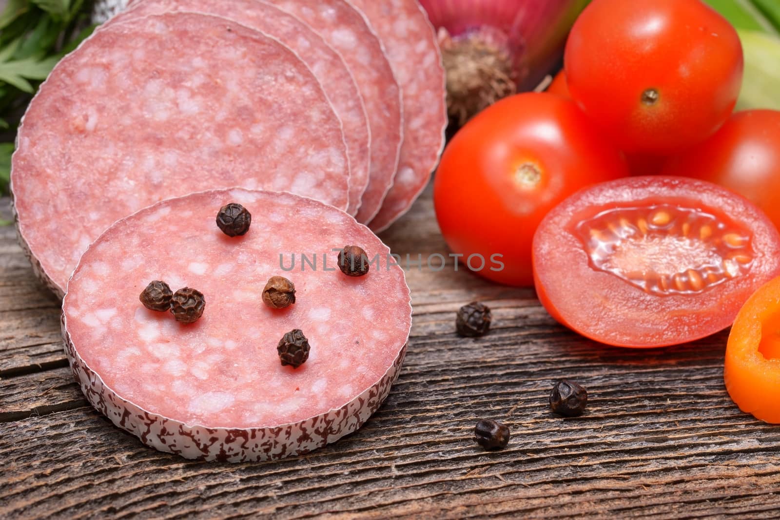 fresh Salami on wooden table 