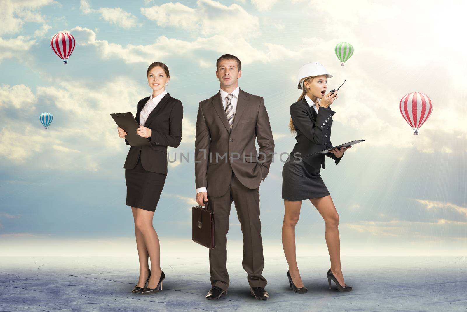 Young attractive business people by cherezoff